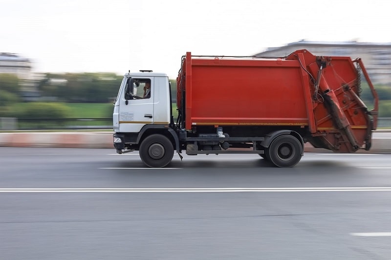 Rubbish truck heading to waste transfer station